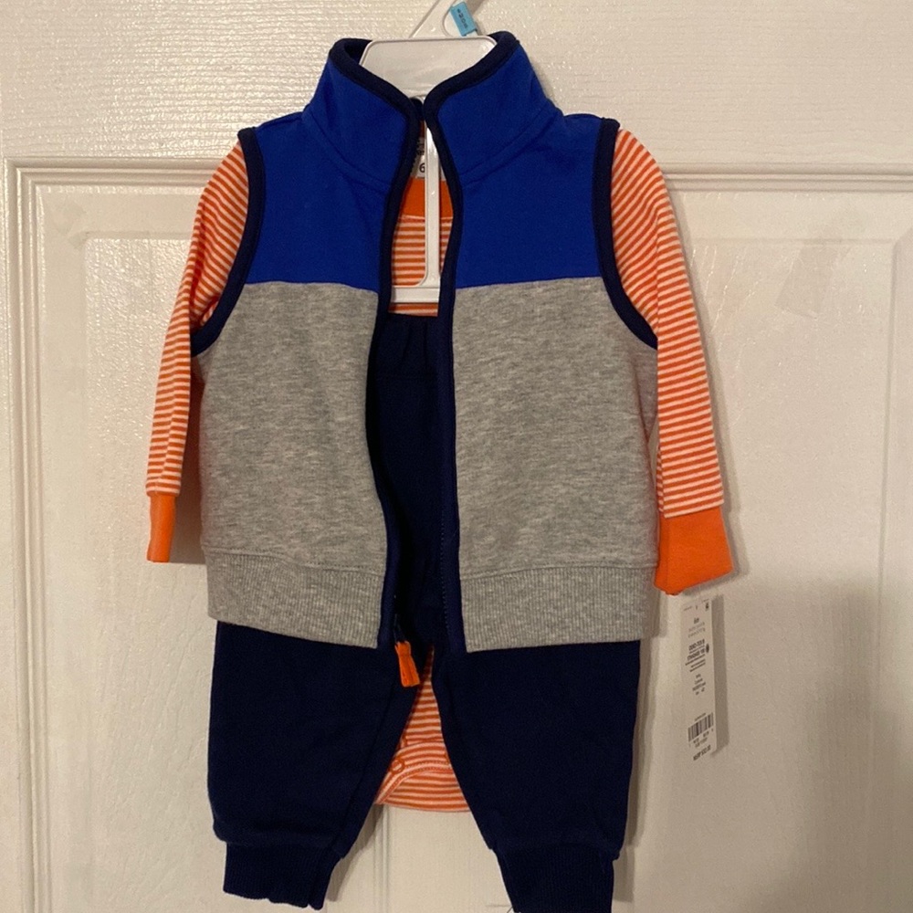 Carters 3 piece boys outfit . Sizes 6 months and 18 months.